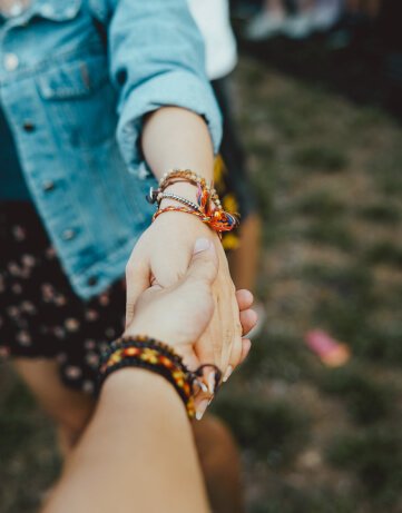 Two women shaking hands